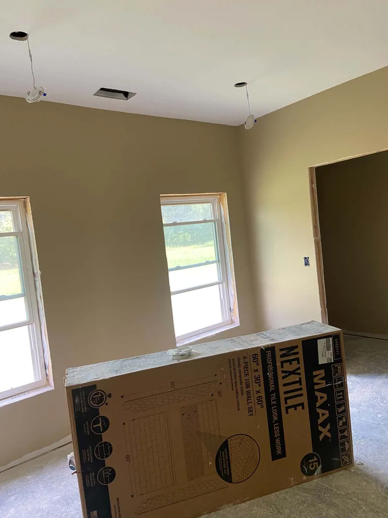 Master suite with finished drywall, painted walls, and recessed lighting