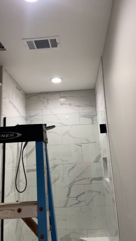 Custom walk-in shower tiling work in progress