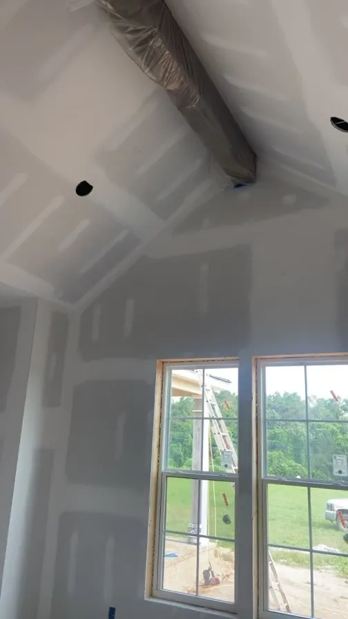 Vaulted ceiling sheetrock hung and mudded during construction