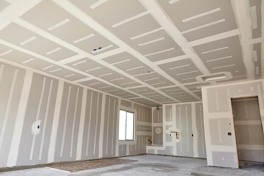 Residential sheetrock interior with finished walls and ceiling